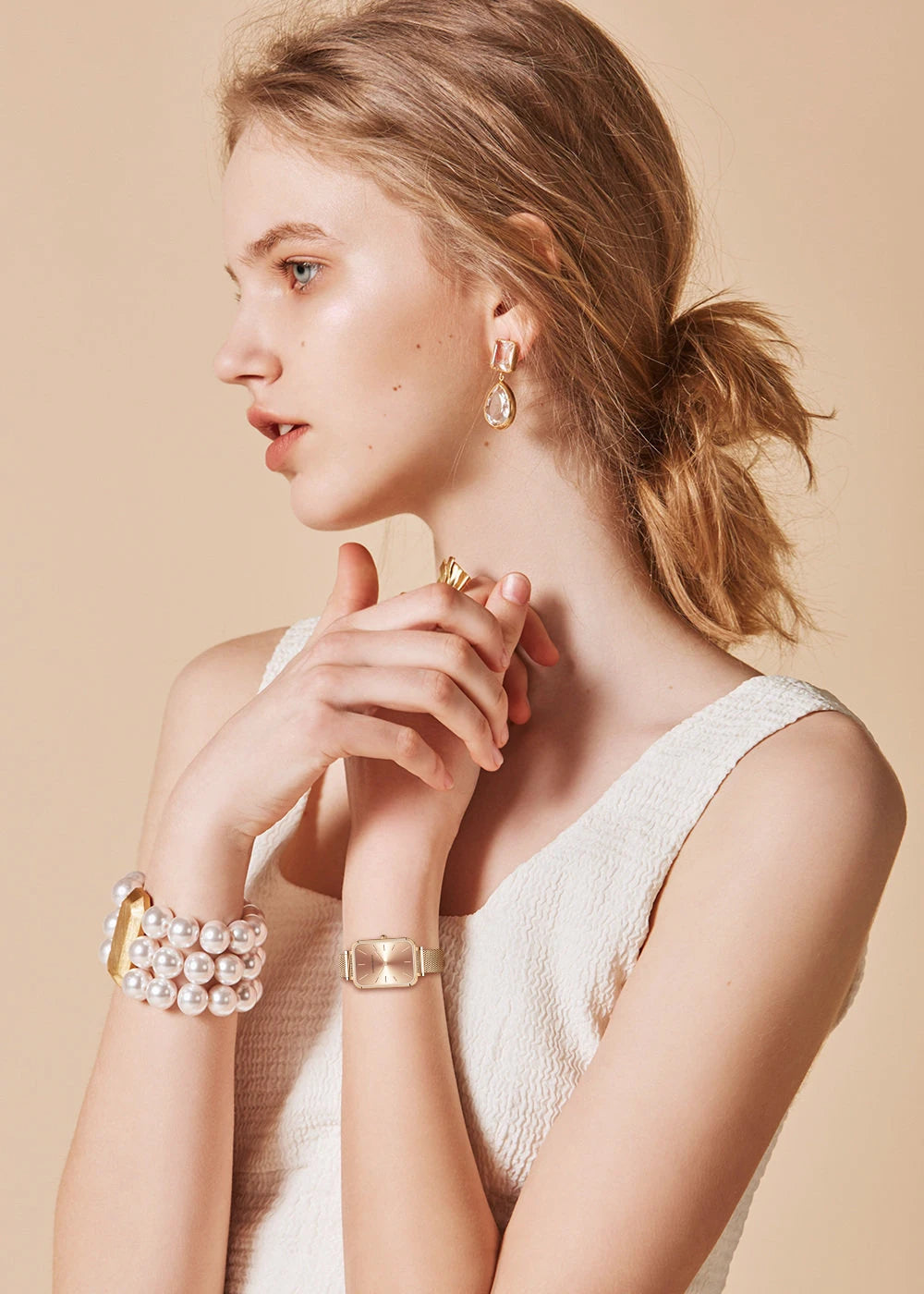 Dámské hodinky s čtvercovým ciferníkem a síťovaným páskem v růžovém zlatě