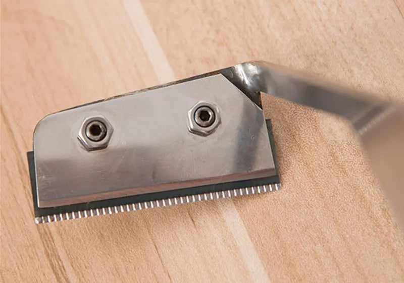 Grattoir à argile dentelé avec lame remplaçable
