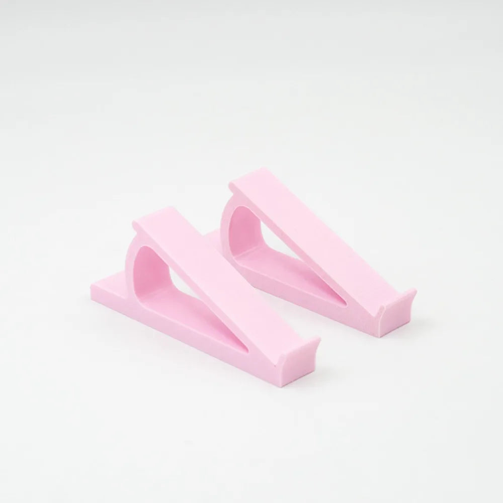 Coppia di rialzi in plastica per tastiera