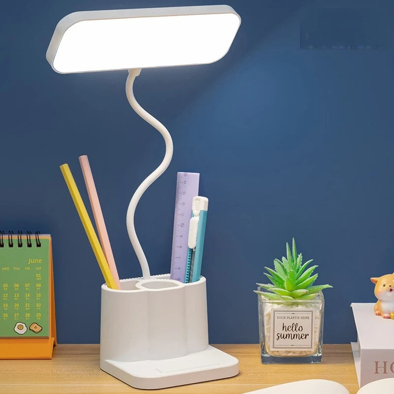 Stolová lampa s nastaviteľným jasom a priehradkou na perá