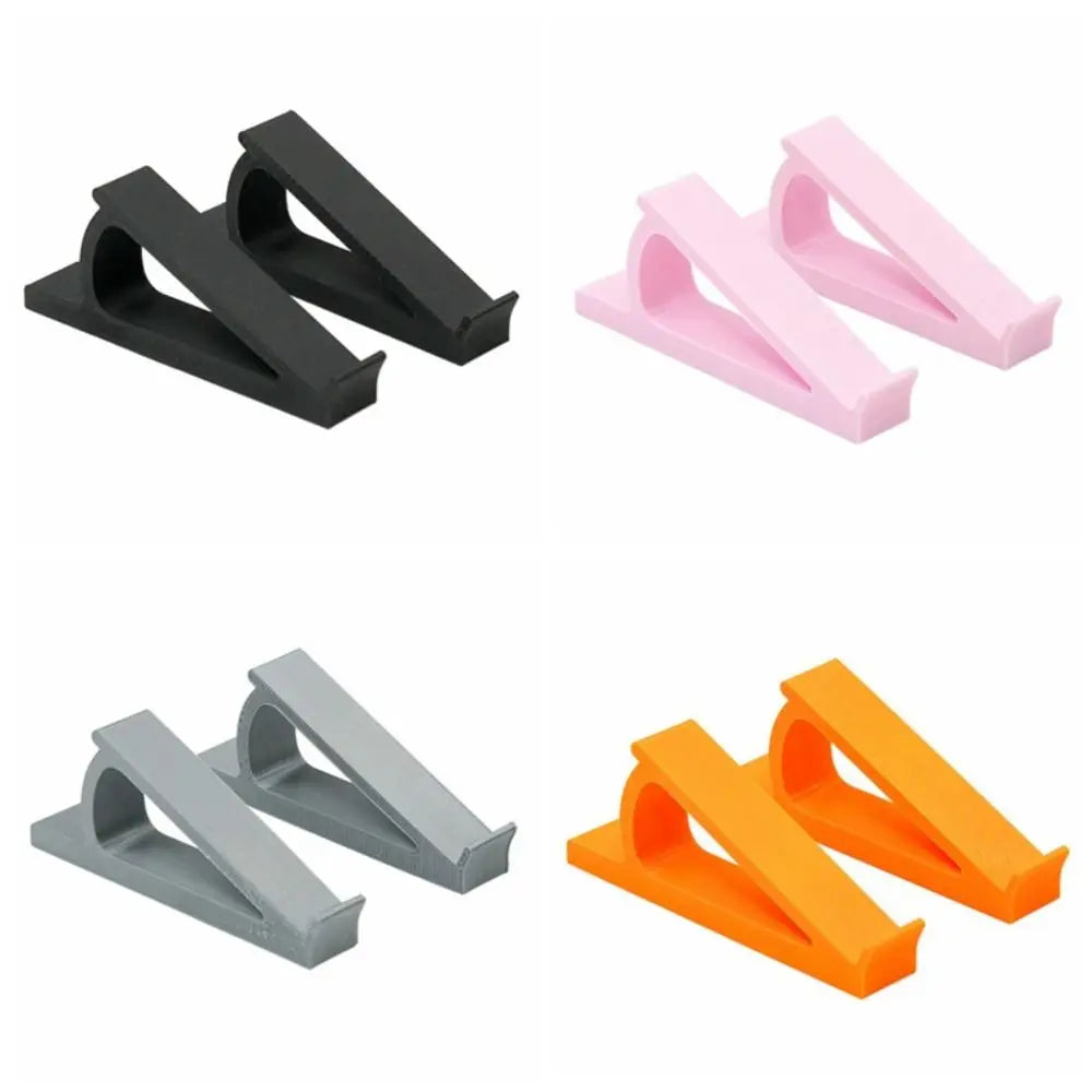 Coppia di rialzi in plastica per tastiera