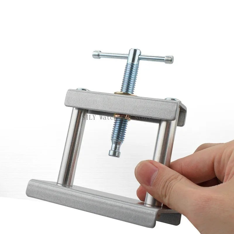 Presse pour boîtier de montre et cristal avec options de matrice