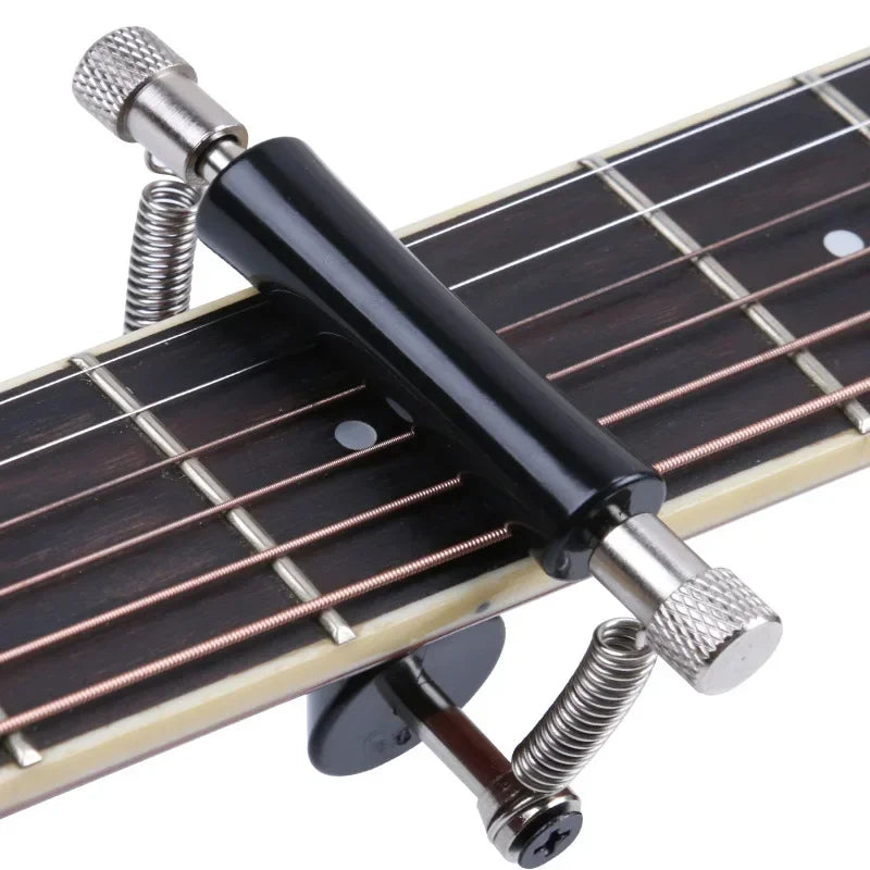 Rolling Guitar Capo with Padded Contact Surfaces