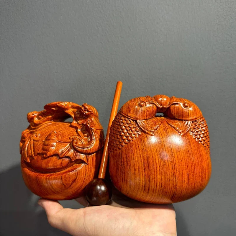 Pequeño instrumento de percusión de pez de madera