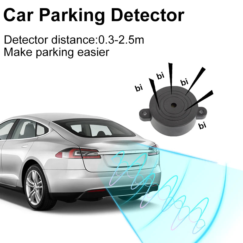 Four silver parking sensors with buzzer and installation accessories