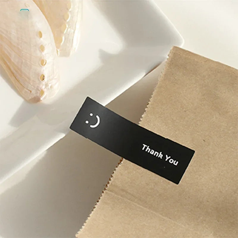 120Pcs/roll Smiling Face Black and White Thank You Rectangular Seal Sticker Gift Sticker for Homemade Packaging Decoration Label
