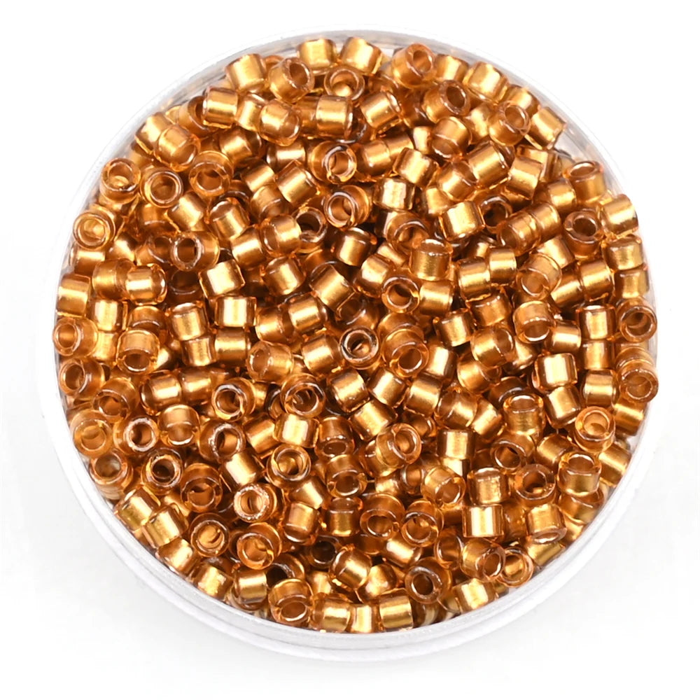 Cuentas de vidrio de 2.5 mm con centros de color oro – 1000 piezas