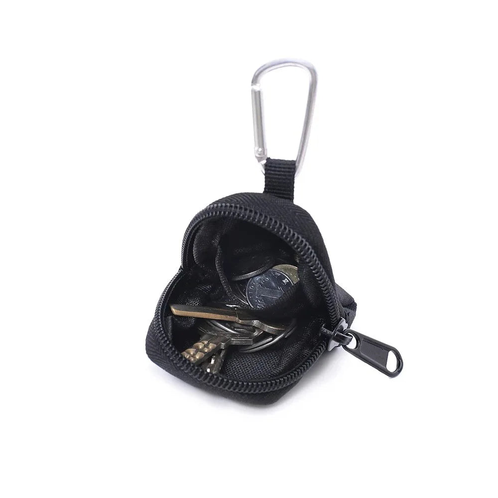 Compacte taille-tas voor sleutels en munten
