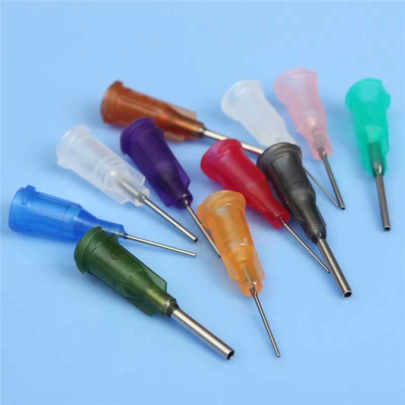 Průhledná lahvička s lepidlem a dávkovačem s přesnou jehlou