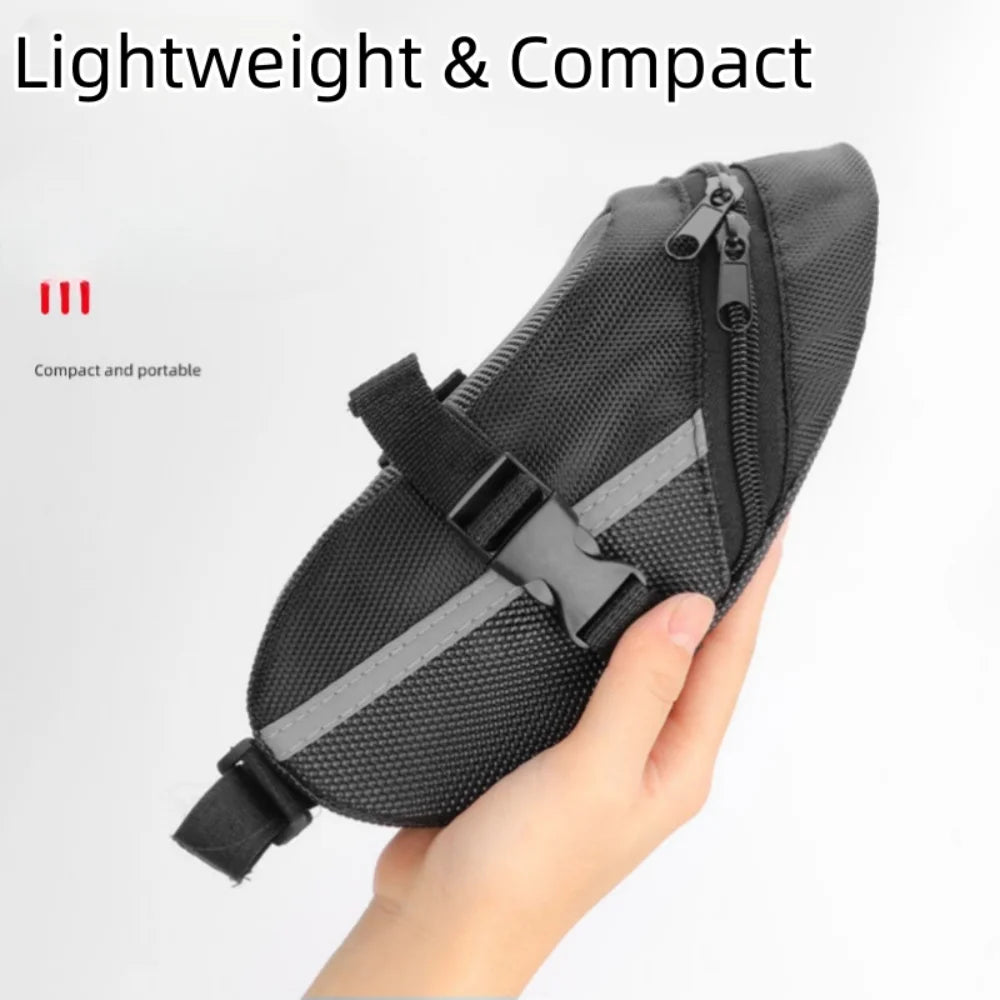Bolsa reflectante para sillín de bicicleta con compartimento trasero