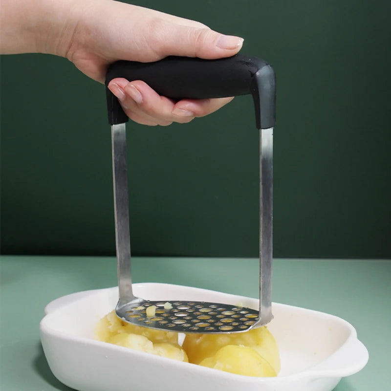 Draagbare aardappelpuree pers