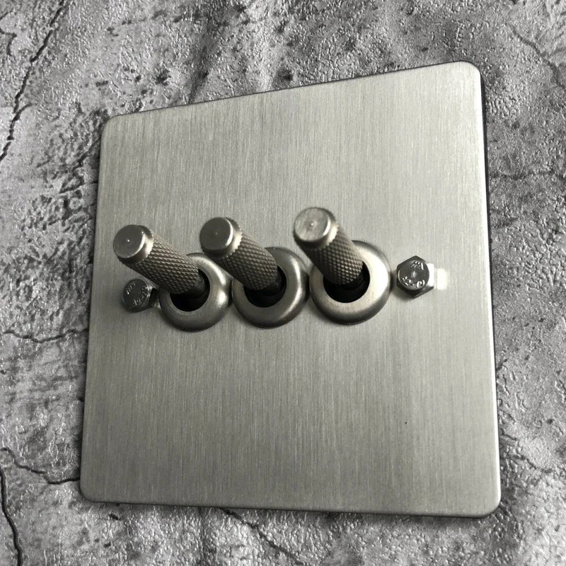 Interruptores de pared, enchufes y accesorios de acero cepillado