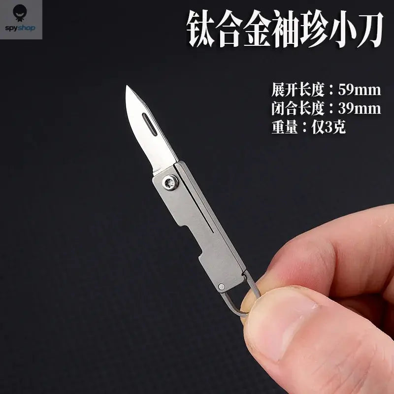 Titanium alloy pocket knife with sharp folding edge, portable keychain pendant, unboxing and unpacking, express knife