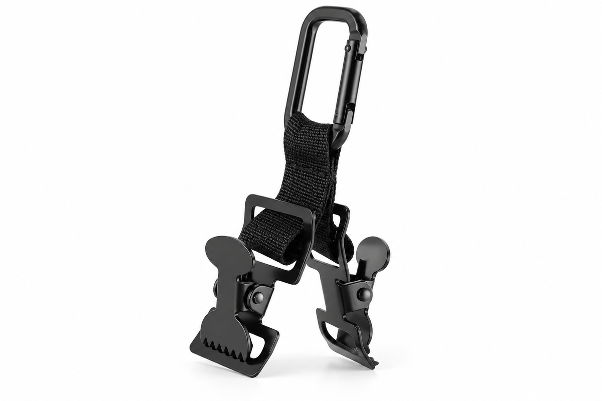 Unbranded double-grip golf glove and towel clip with carabiner on white background