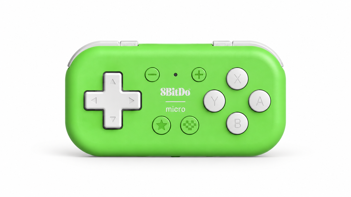 Green 8BitDo Micro gamepad on white background