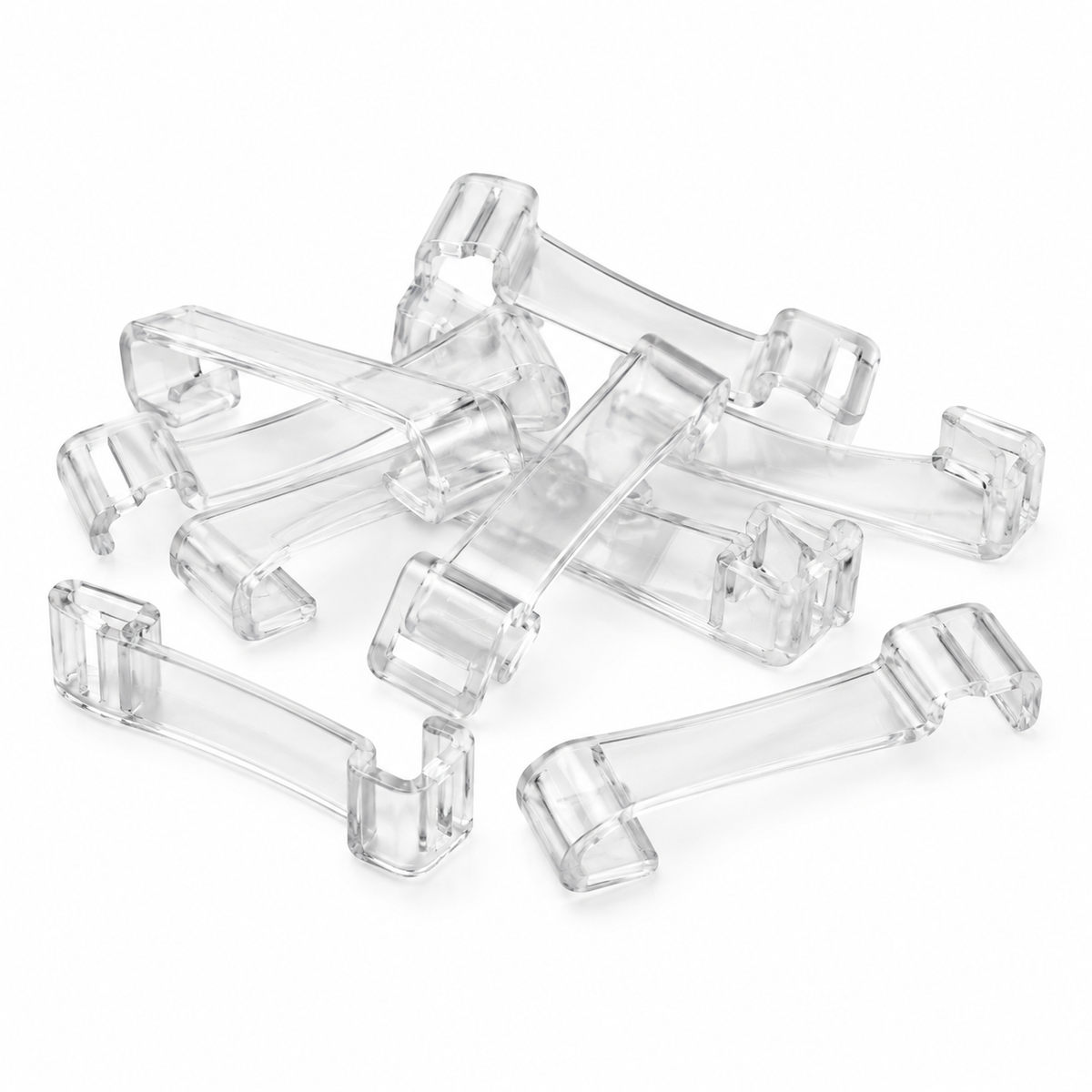 Transparent garment clips on white background