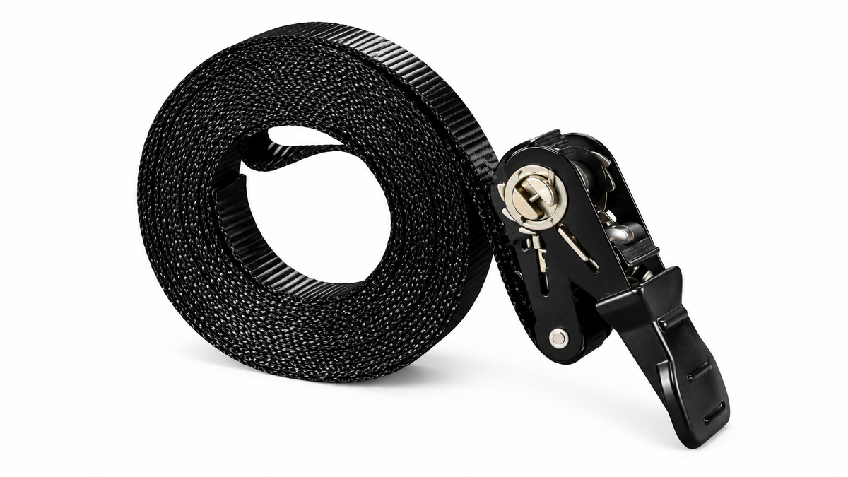Black polyester cargo tie-down strap with ratchet on white background