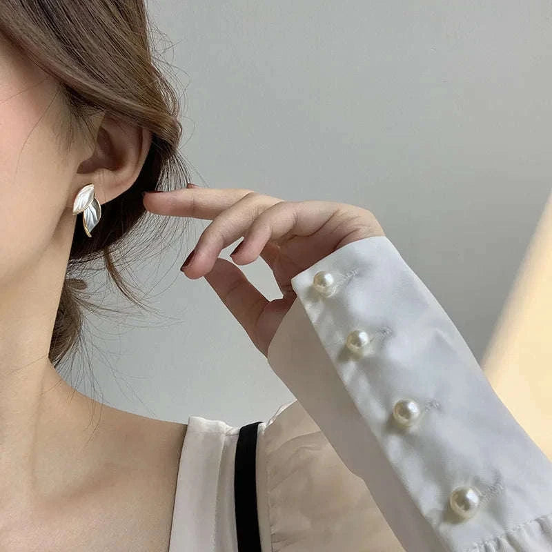 Korean Metal Leaf Stud Earrings-661730