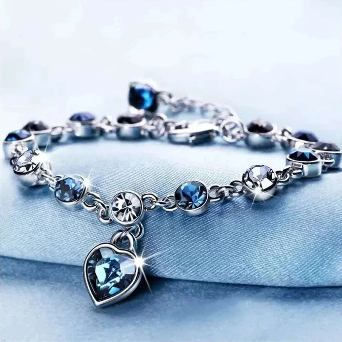 Women’s Blue Crystal Heart Bracelet in Silver Tone-ASL70250
