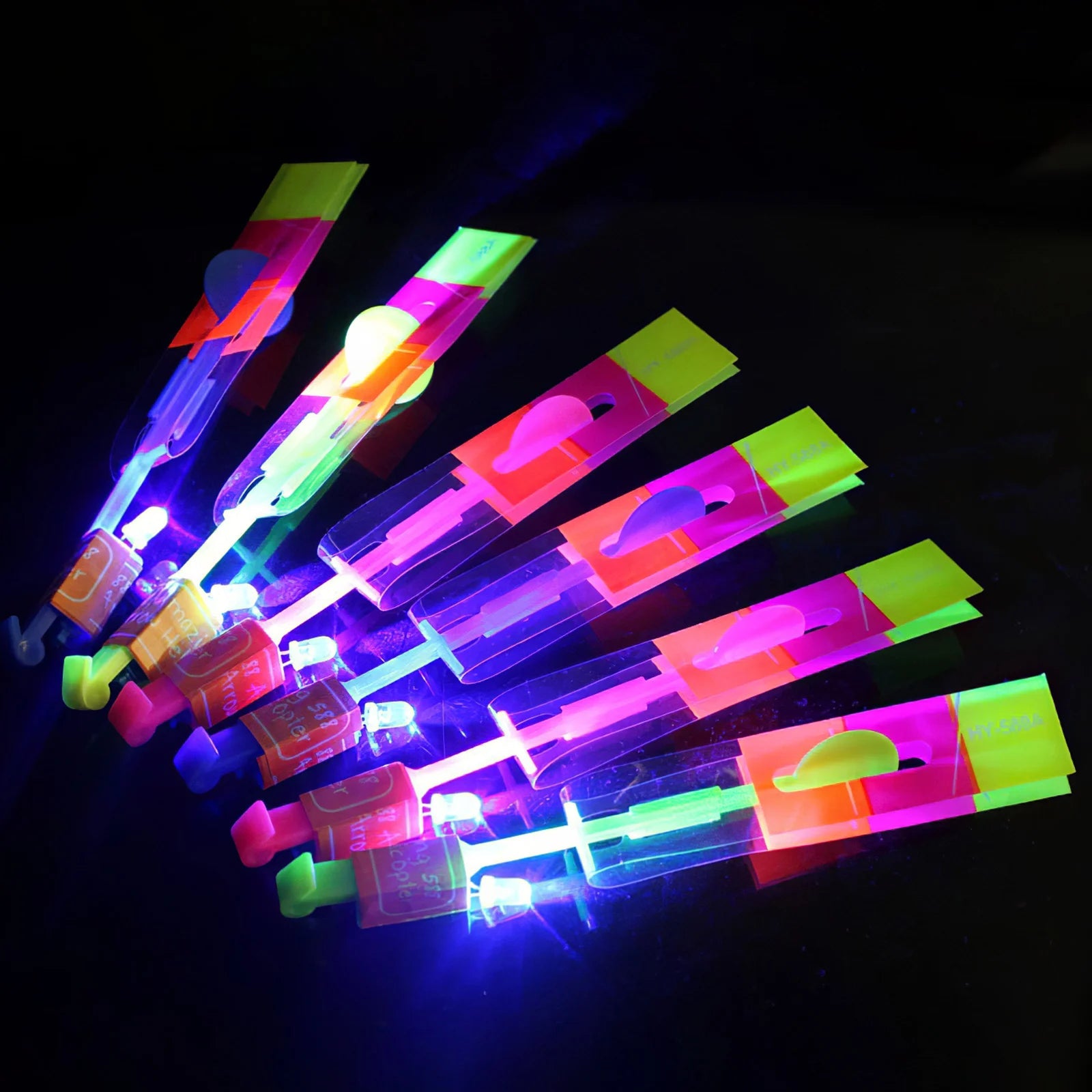 10PCS Outdoor Shining Rocket Flash LED Light Night Kids Luminous Slingshot Toys Shine Slingshot Elastic Helicopter Rotating Toy 