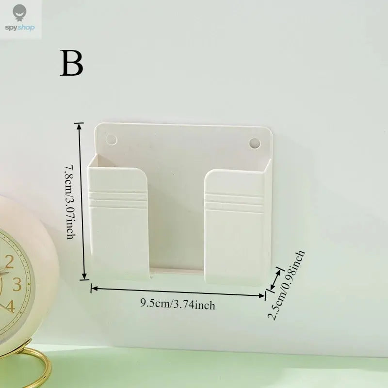 Multi-functional Wall-mounted Organizer for Remote Controls and Mobile Phones Spy-shop.com