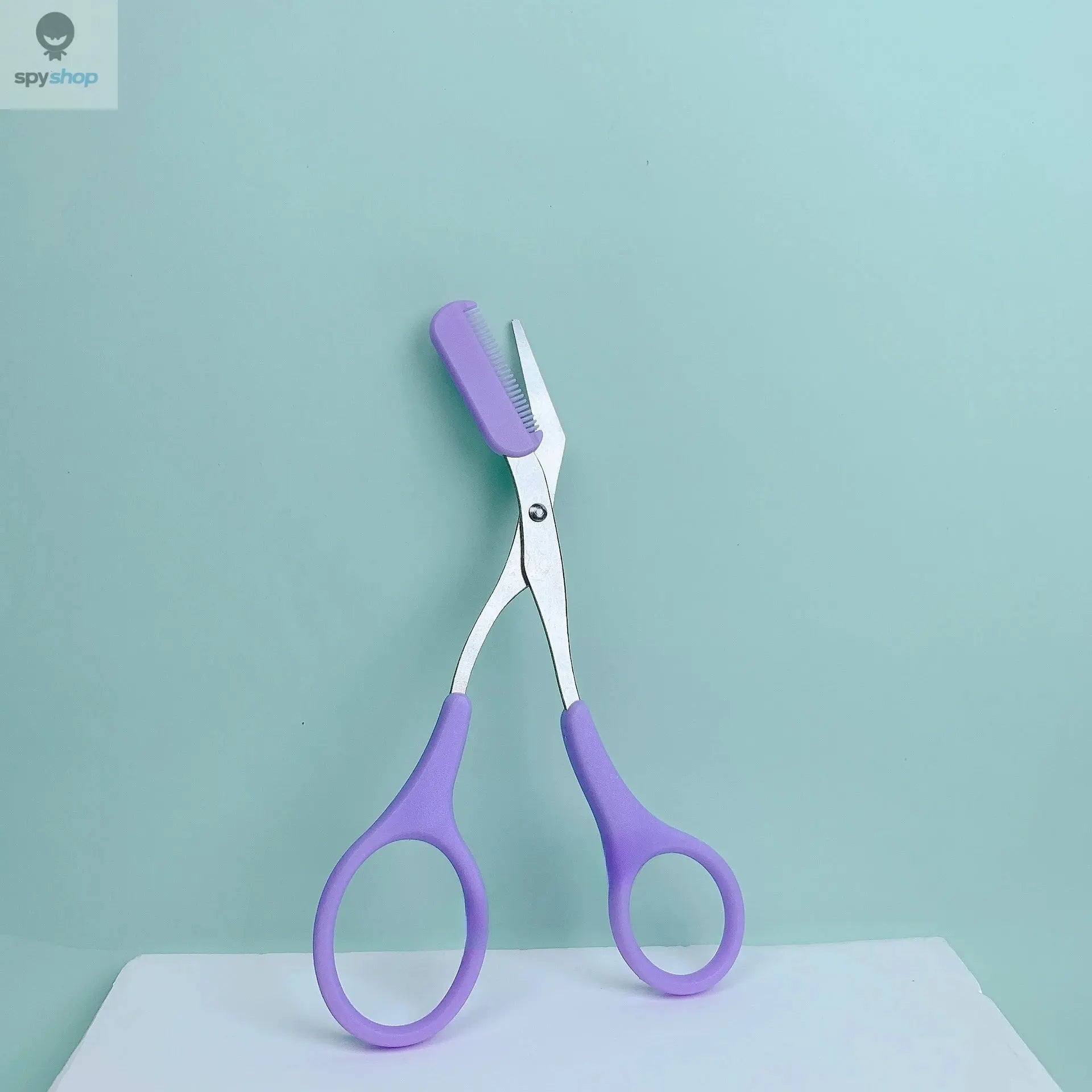 Pink eyebrow trimming scissors with built-in comb - stainless steel, precise grooming tool, creating perfect eyebrows Spy-shop.com