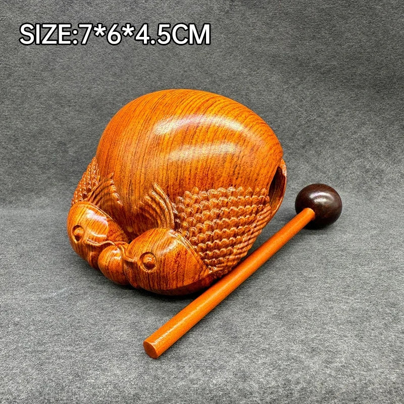 Pequeño instrumento de percusión de pez de madera