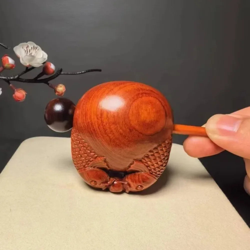 Pequeño instrumento de percusión de pez de madera