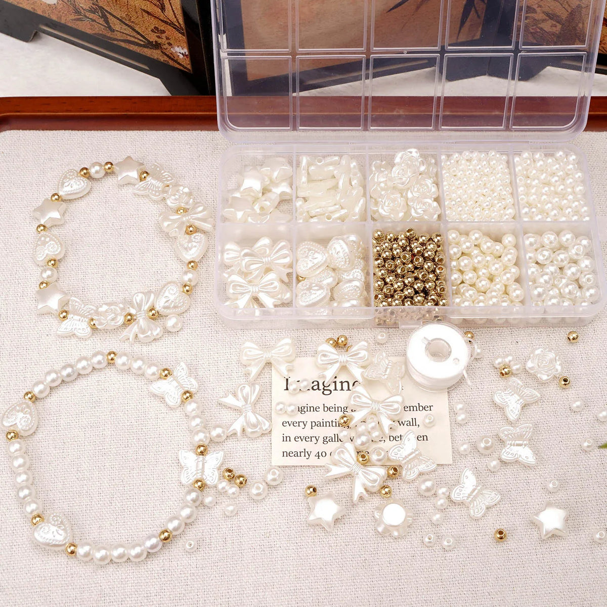 Set de 800 de perle false albe pentru realizarea bijuteriilor