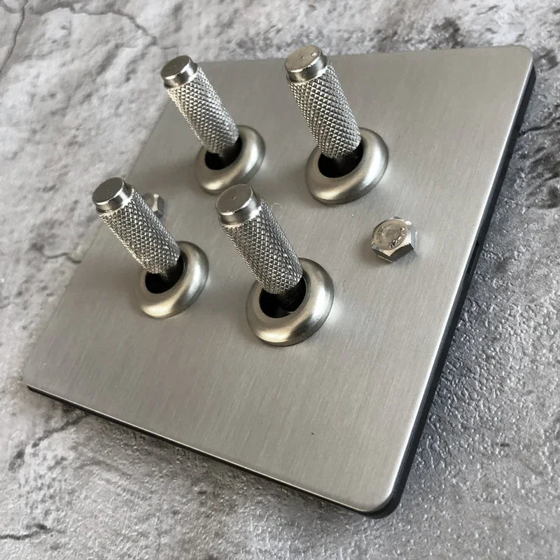 Interruptores de pared, enchufes y accesorios de acero cepillado