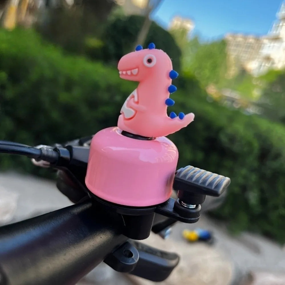Zvonček na riadidlá bicykla s motívom dinosaura