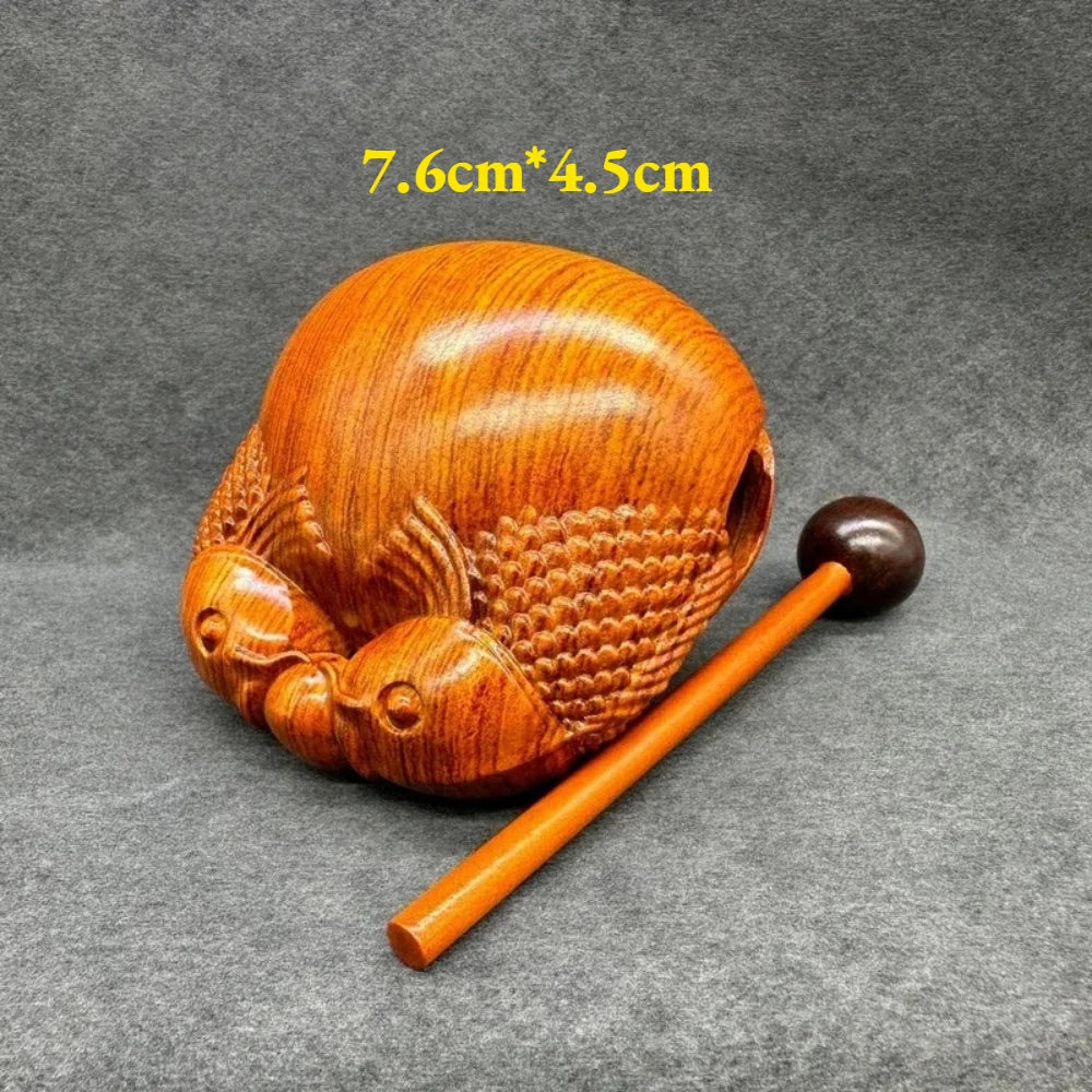 Pequeño instrumento de percusión de pez de madera
