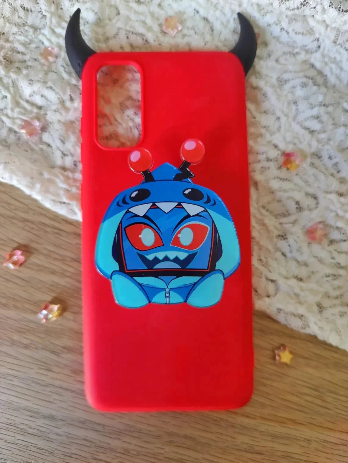 Phone Stand with Helluva Boss and Hazbin Hotel Artwork