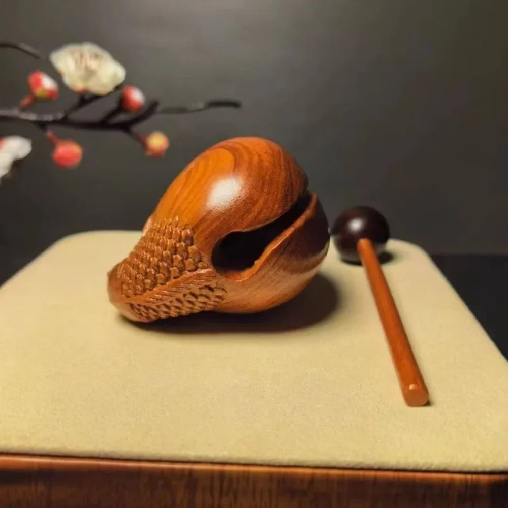Pequeño instrumento de percusión de pez de madera