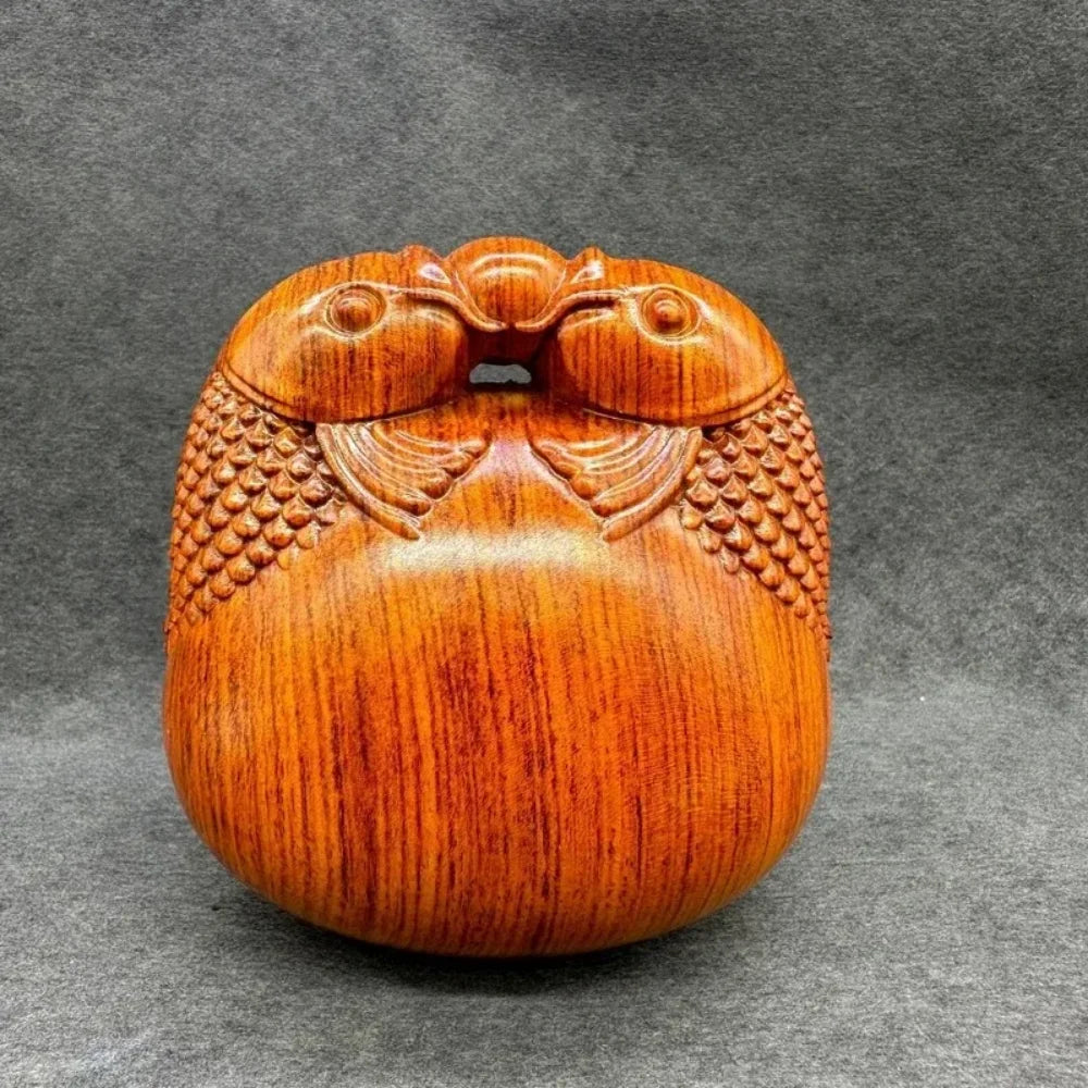 Pequeño instrumento de percusión de pez de madera