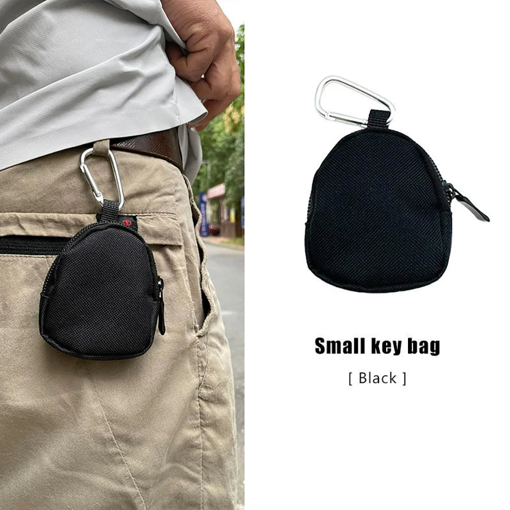 Compacte taille-tas voor sleutels en munten