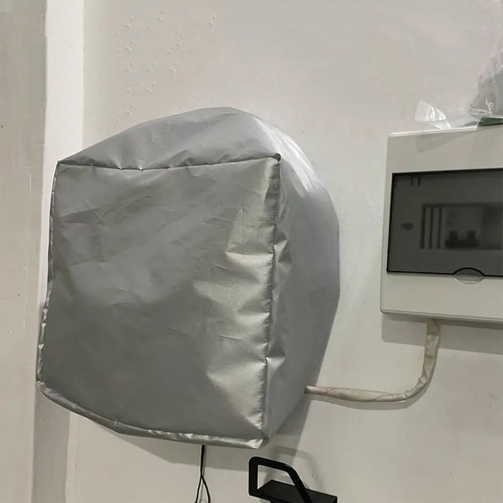 Förvaringsskydd för laddstation till elbil, silverfärgat