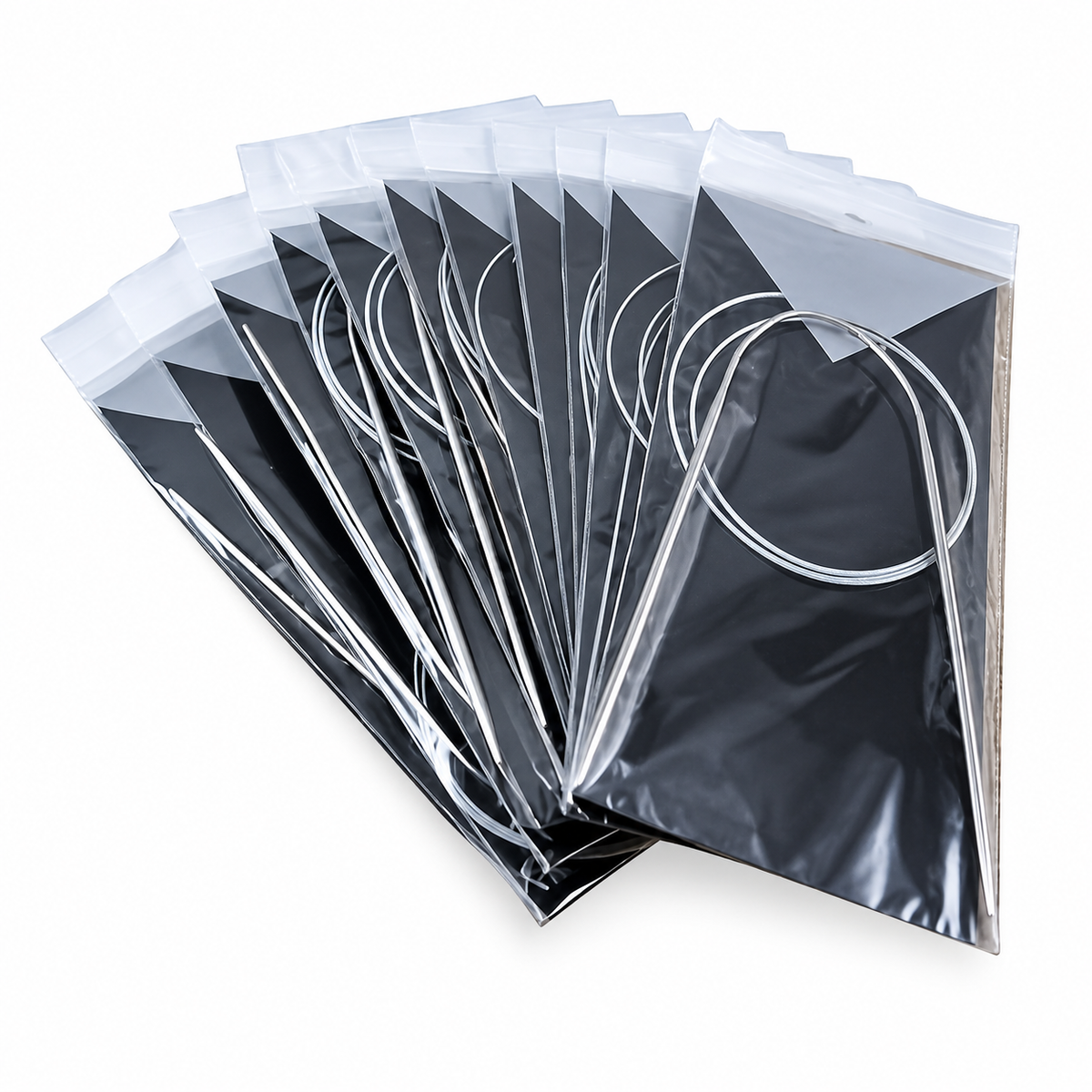 Packaged circular knitting needle set on white background