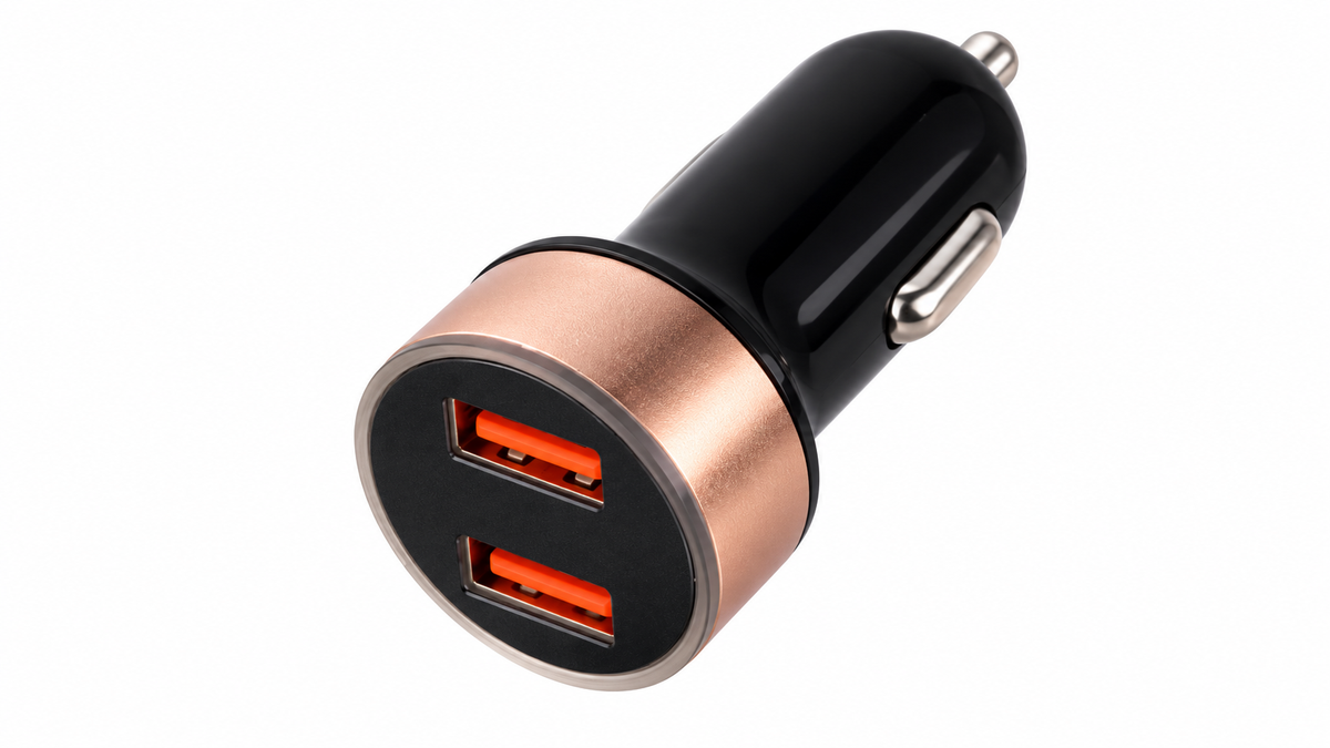 Black and copper dual USB car charger on white background