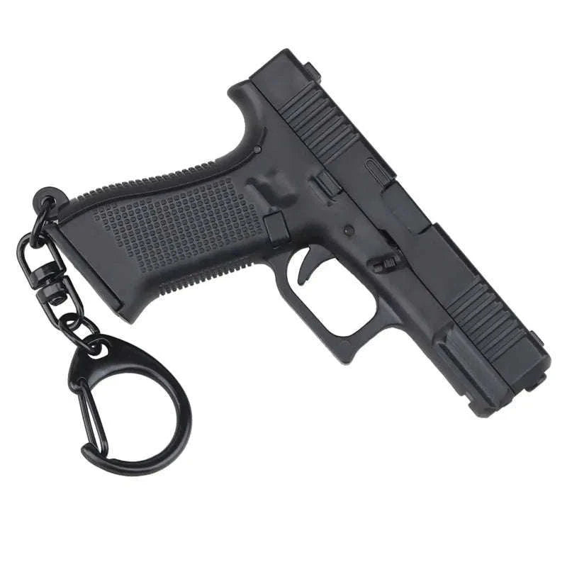 Pistol Shaped Keychain Charm with Removable Magazine-Pink