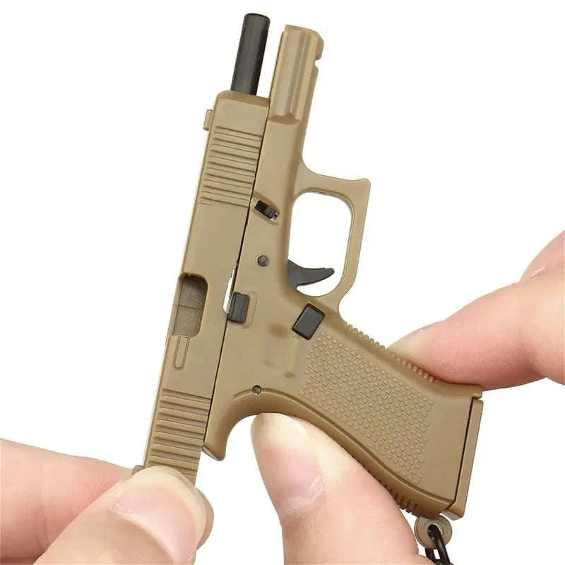 Pistol Shaped Keychain Charm with Removable Magazine-Pink