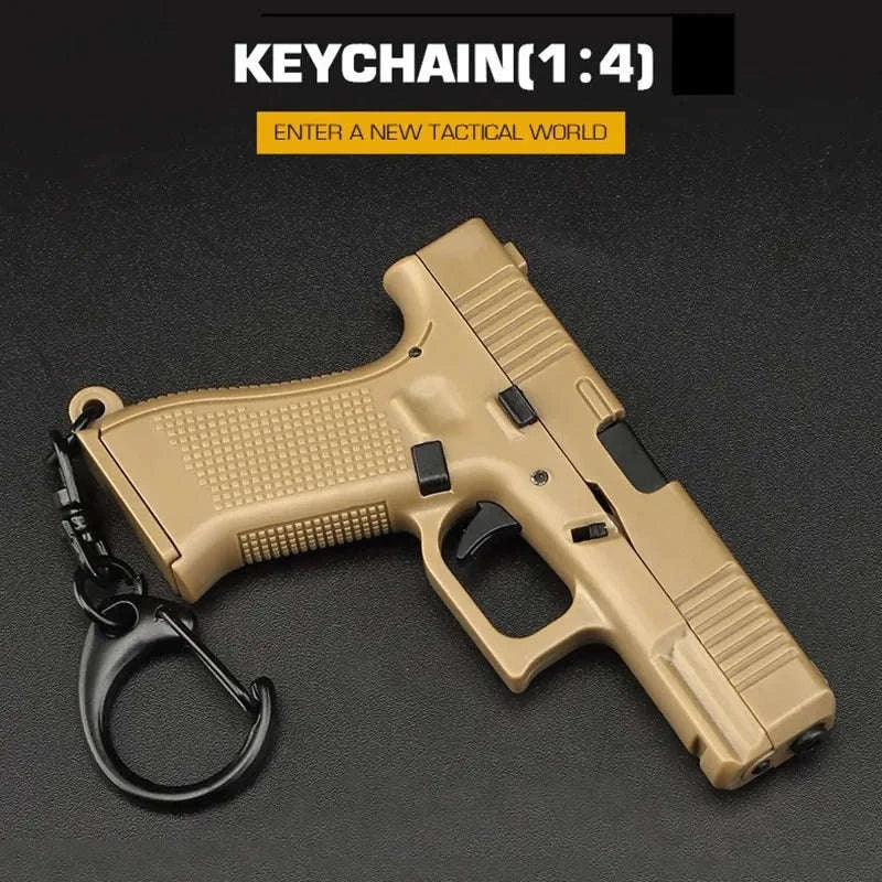 Pistol Shaped Keychain Charm with Removable Magazine-Pink