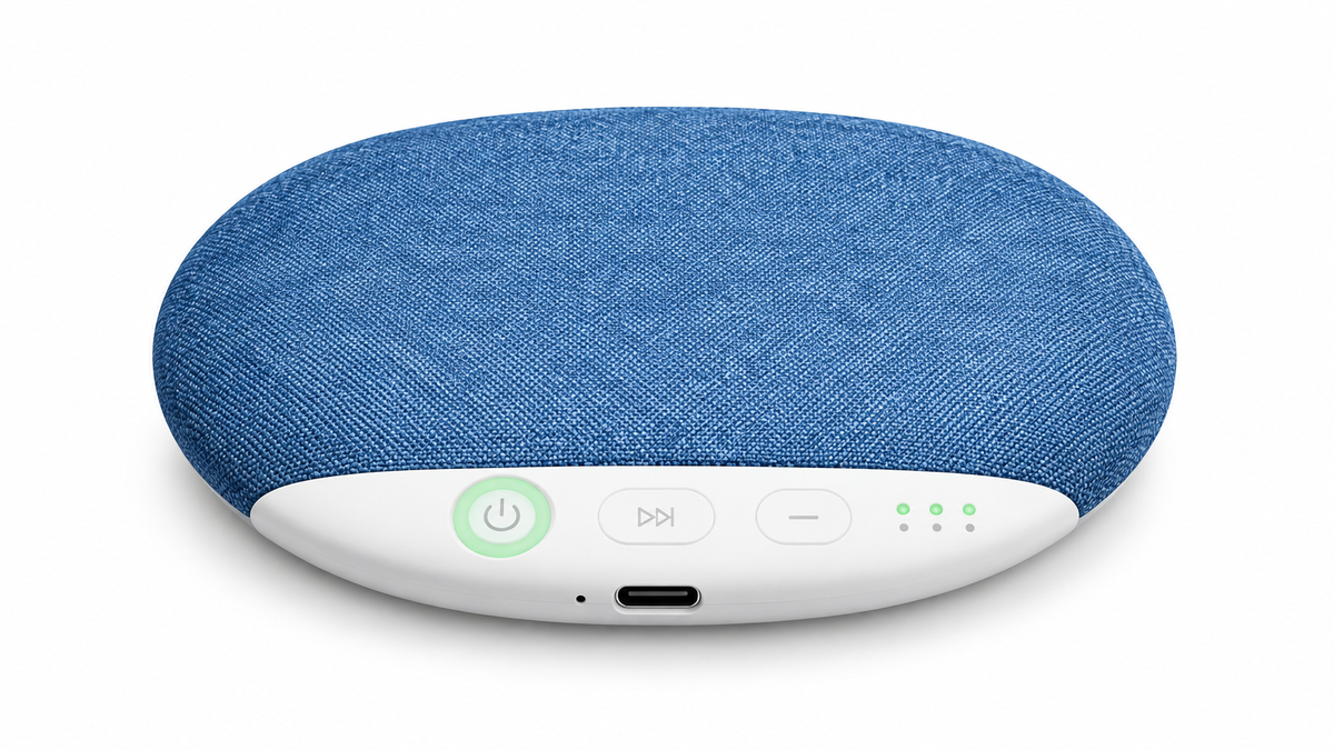 Blue under-pillow sleep speaker on white background