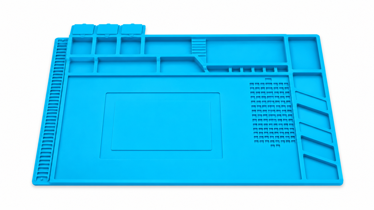 Blue silicone electronics repair mat on white background